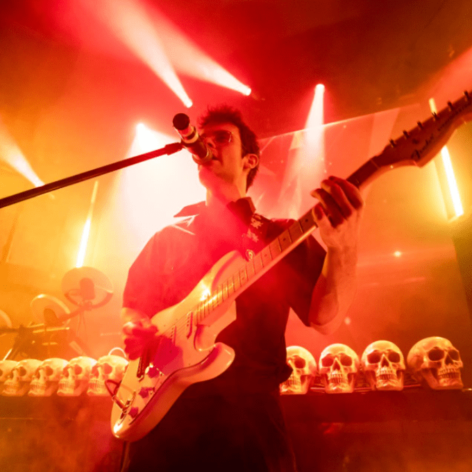 a person standing in front of a stage